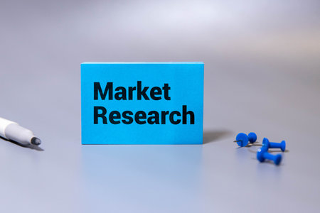 Market Research word written on wood block. Market Research text on gray table, conceptの写真素材