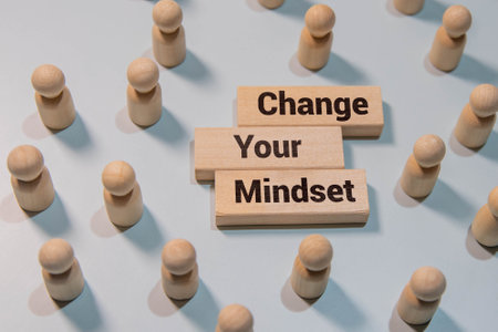 Change your mindset symbol. Concept words Change your mindset on wooden blocks. Beautiful deep blue background with boat. Business and Change your mindset concept. Copy space.の写真素材