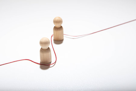 The human figure is connected by lines with three persons. Management and giving orders to staff. Leadership, teamwork. Cooperation and collaboration. Shares experiences and information.の写真素材