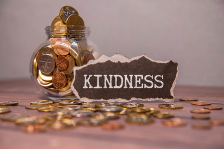 KINDNESS - words from wooden blocks with letters, KINDNESS concept, top view background.