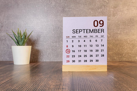 September 15 calendar date text on wooden blocks with copy space for ideas or text. Copy space and...