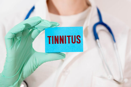 On the card text TINNITUS , next to the white tablets.