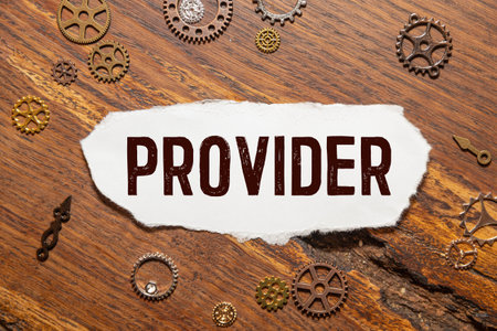 gears and a scrap of white paper that says PROVIDER.の写真素材