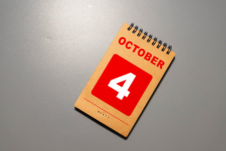 October 4 calendar date text on wooden blocks with copy space for ideas or text.の写真素材