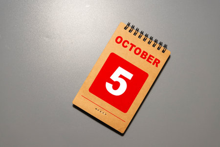Wood calendar with date. Saturday 5 Octoberの写真素材