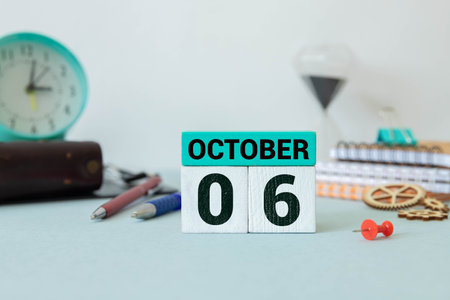 October 6 calendar date text on wooden blocks with copy space for ideas or text.の写真素材