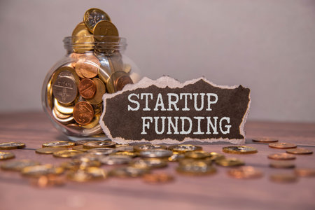 Startup Funding - act of raising capital to support a business venture, text concept backgroundの写真素材