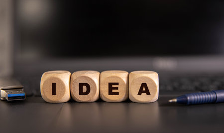 Wooden blocks cubes that say the word idea.の写真素材