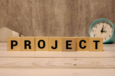 Project word from wooden blocks on gray backgroundの写真素材