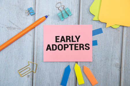 EARLY ADOPTERS text on a notebook