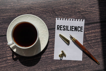 Resilience - word concept on building blocks, text, letters.の写真素材