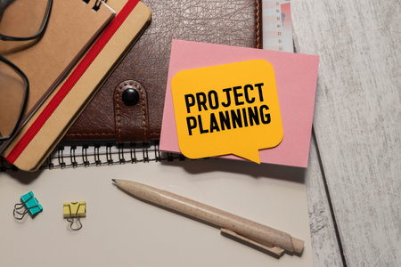 Word text Project Closure memo written on a brown craft paper as background with red pencilsの写真素材