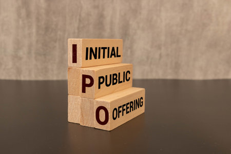 text IPO on wooden blocks with letters on a white background