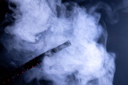 Hookah or shisha hot coals, dark black smoke backgroundの写真素材