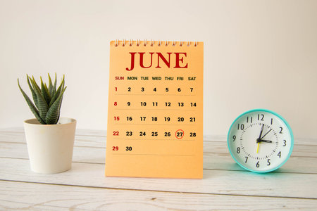 June Month, Appointment date with number cube design, colorful stone. Date 27.の写真素材