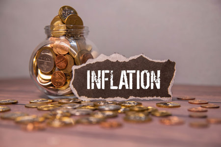 INFLATION text on notebook with chart and pen business conceptの写真素材