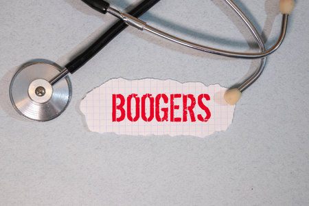 boogers colorful word on the wooden background with stethoscope
