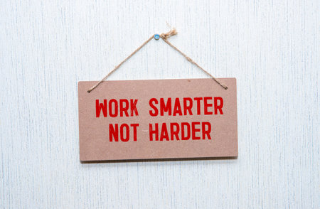 Wooden blocks with words 'Work Smarter Not Harder'.の写真素材