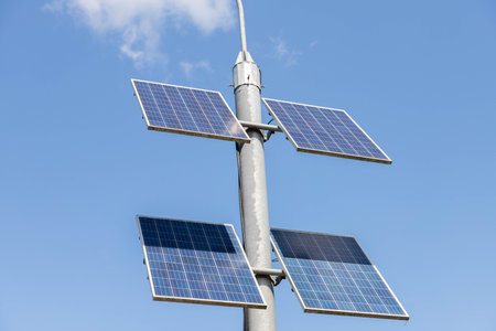 Pole mounted with solar panels and lights led illuminating