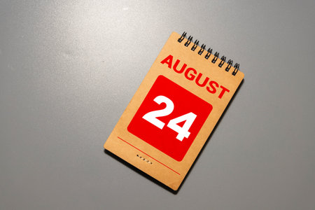 Vintage photo, August 24th. Date of 24 August on wooden cube calendar, copy space for text on boardの写真素材
