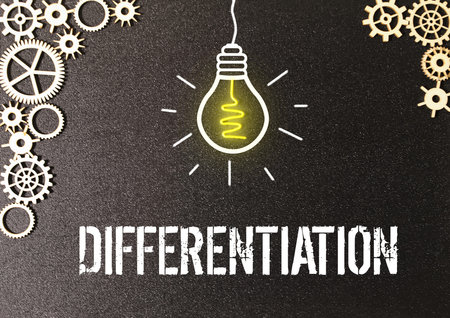 brown paper with the word differentiation. the action or process of differentiating or...