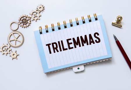 There is a notebook with the word Blockchain Trilemma. It is eye-catching image