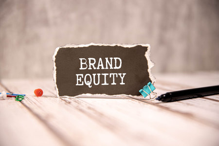 Strong Brand Equity symbol. Concept words Strong Brand Equity on wooden blocks. Beautiful gray green background. Business and Strong Brand Equity concept. Copy spaceの写真素材
