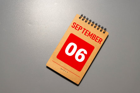 September 6th. Image of September 6 wooden color calendar on white background. Autumn day. Empty...