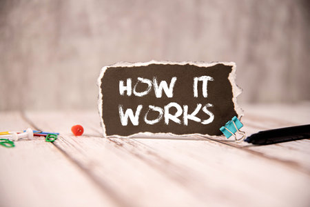 Close up of business woman hands typing on laptop computer and digital tablet, searching and surfing the internet on office desk, online working, telecommuting, freelancer at work conceptの写真素材