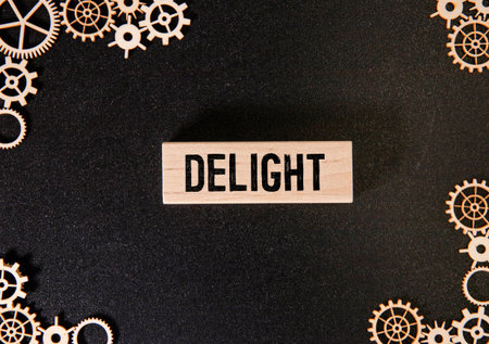 flat lay of pastel colorful candy hearts against a pink background with copy text and copy spaceの写真素材