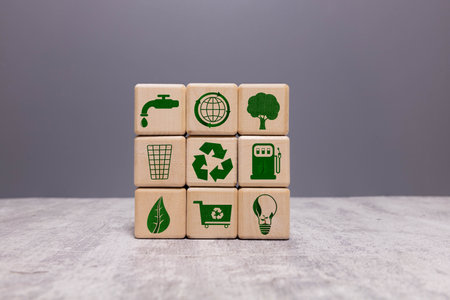 icons related to reduce, reuse, recycle on green background blocks The concept of reduce, reuse, reuse symbols, ecological waste management and sustainable and economical lifestyles.の写真素材