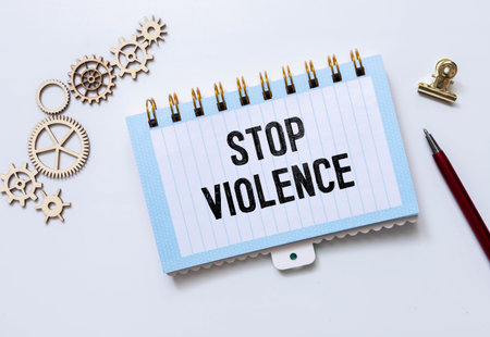 a purple ribbon for the awareness about the unacceptability of the violence against women and the...