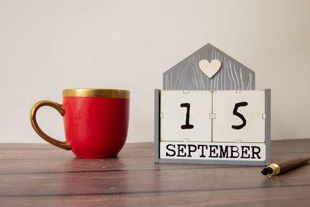 Wooden calendar with the date September 15.Monthly calendar for planning and management concept with...