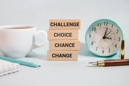 Change your story symbol. Concept word Change your story on wooden blocks. Beautiful blue background. Businessman hand. Business and Change your story concept. Copy spaceの写真素材