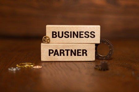 Business partnering text on wooden blocks.の写真素材