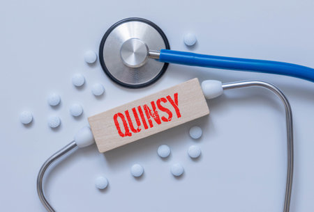 text on wood block, blue background.の写真素材