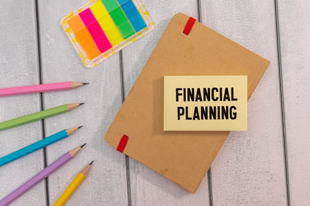 financial plan word written on wood block. financial plan text on cement table for your design,...
