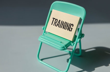 Concept of Training on book with keywords isolated on Wooden Table.