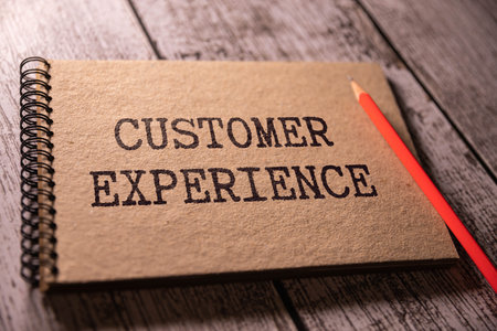 Customer Experience text by the alphabet wood cubes arranged in a rowの写真素材