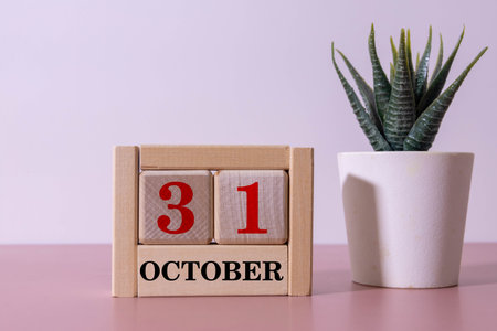 October 31st. Image of October 31 wooden color calendar on white background. Autumn day. Empty space for textの写真素材
