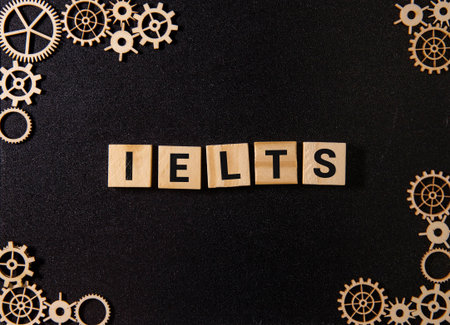 IELTS, text on wood boards against the background of a robotic office.の写真素材