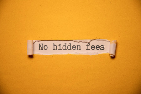no hidden fees. Text on white paper on torn paper.の写真素材
