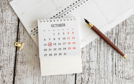 October 14. close-up wooden calendar. Time planning and business background