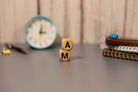 Alphabet foams. letters A and M on wooden cubesの写真素材