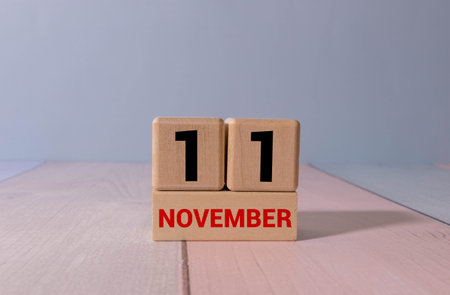 Important date and event on a black and white calendar. Cube date and month, day 11 November. Autumn...