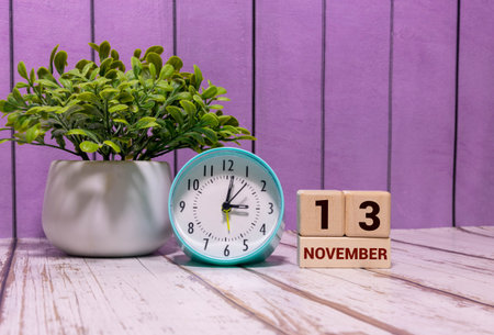 13 November on wooden gray cubes. Calendar cube date 13 November. Concept of date. Copy space for...