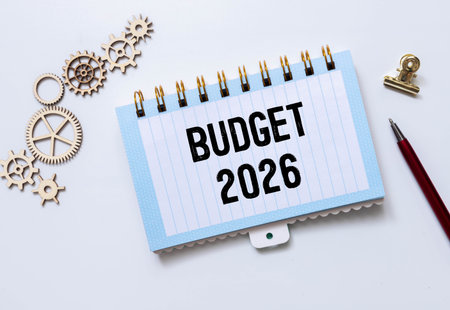 BUDGET 2026 AND REAL ESTATE CONCEPT IN BUILDING ACTIVITY AND CONSTRUCTION INDUSTRY with hand writing...