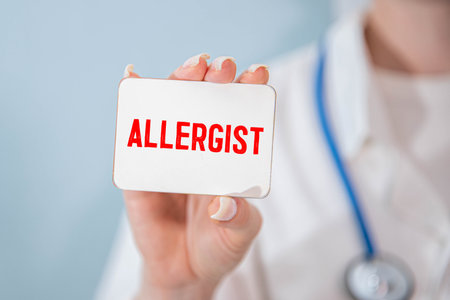 The doctor holds a card with the text ALLERGIST. Medical concept. the medicineの写真素材