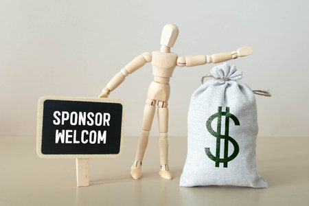 SPONSORS WELCOME on wooden blocks. Sponsorship donation support business startup concept.の写真素材