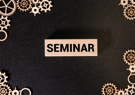 Hand writing Seminar topic on chalkboardの写真素材